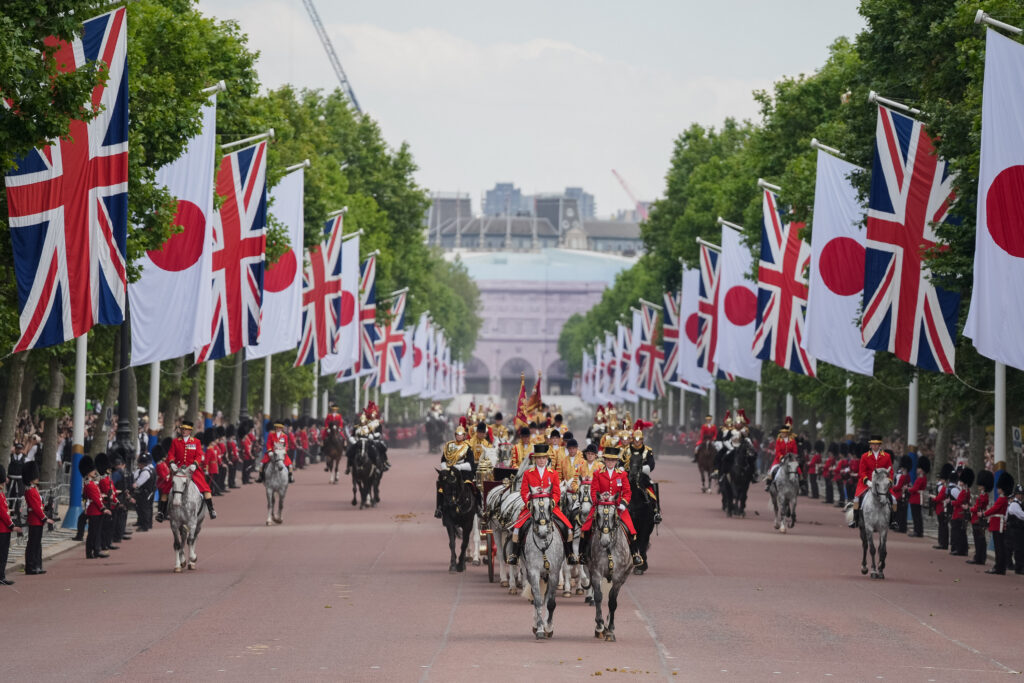 King Charles III, and Japan's Emperor Naruhito ride in a open carriage during the ceremonial welcome for the Japanese State Visit to Britain